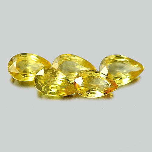 Natural Yellow Sapphire 1.57 Ct. 5 Pcs. Pear Shape 5 x 3.1 Mm Gemstones From Thailand: Product ID: 806156339 Product Name: Natural Yellow Sapphire Weight: 1.57 CT. Size: 5 x 3.1 x 2.7 MM. Shape: Pear Color: Yellow Clarity:VSI Luster: Good Gems Origin: Thailand Treatment: Heated Crystal 