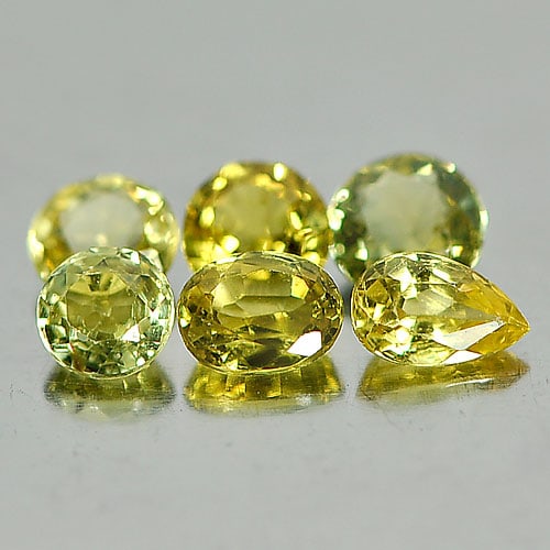 Natural Yellow Sapphire 1.65 Ct. 6 Pcs. Mix Shape Gemstone From Thailand: Product ID: 806152085 Product Name: Natural Yellow Sapphire Weight: 1.65 CT. Size: 3.5 x 3.5 x 2.3to4.1 x 4.1 x 2 MM. Shape: Mix Shape Color: Yellow Clarity:VSI Luster: Good Gems Origin: Thailand Trea