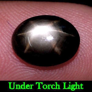 Natural Black Star Sapphire 2.71 Ct. Oval Cabochon Shape 8.6 x 6.7 Mm. Gemstone From Thailand: Product ID: 806139559 Product Name: Natural Star Sapphire Weight: 2.71 CT. Size: 8.6 x 6.7 x 4 MM. Shape: Oval Cabochon Color: Black Clarity:Opaque Luster: Good 6 Rays Star Gems Origin: Thailand Treat