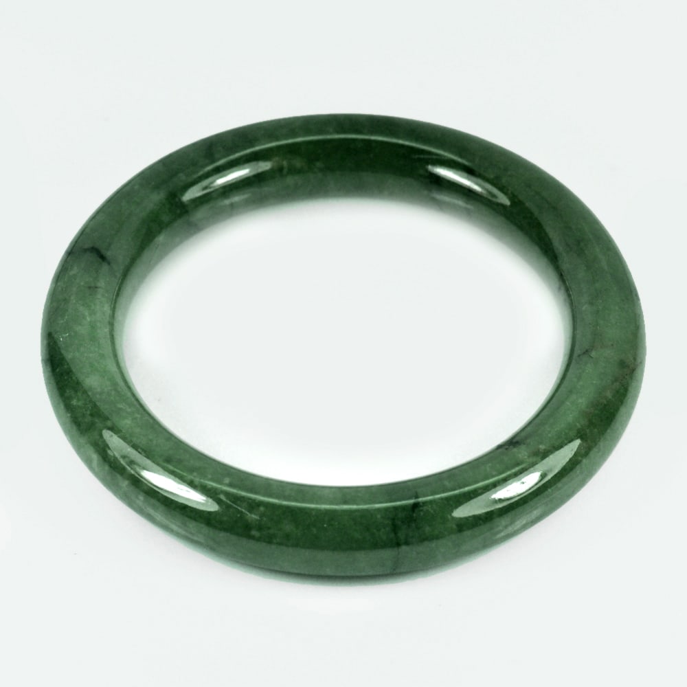 Natural Green Jade 411.42 Ct. Bangle Diameter 60 Mm. Gemstone From Thailand: Product ID: 819814204 Product Name: Natural Jade Weight: 411.42 CT. Size: 80 x 60 x 13 MM. Shape: Round Cabochon Color: Green Clarity:Opaque Luster: Good Gems Origin: Thailand Treatment: Unheated Crys