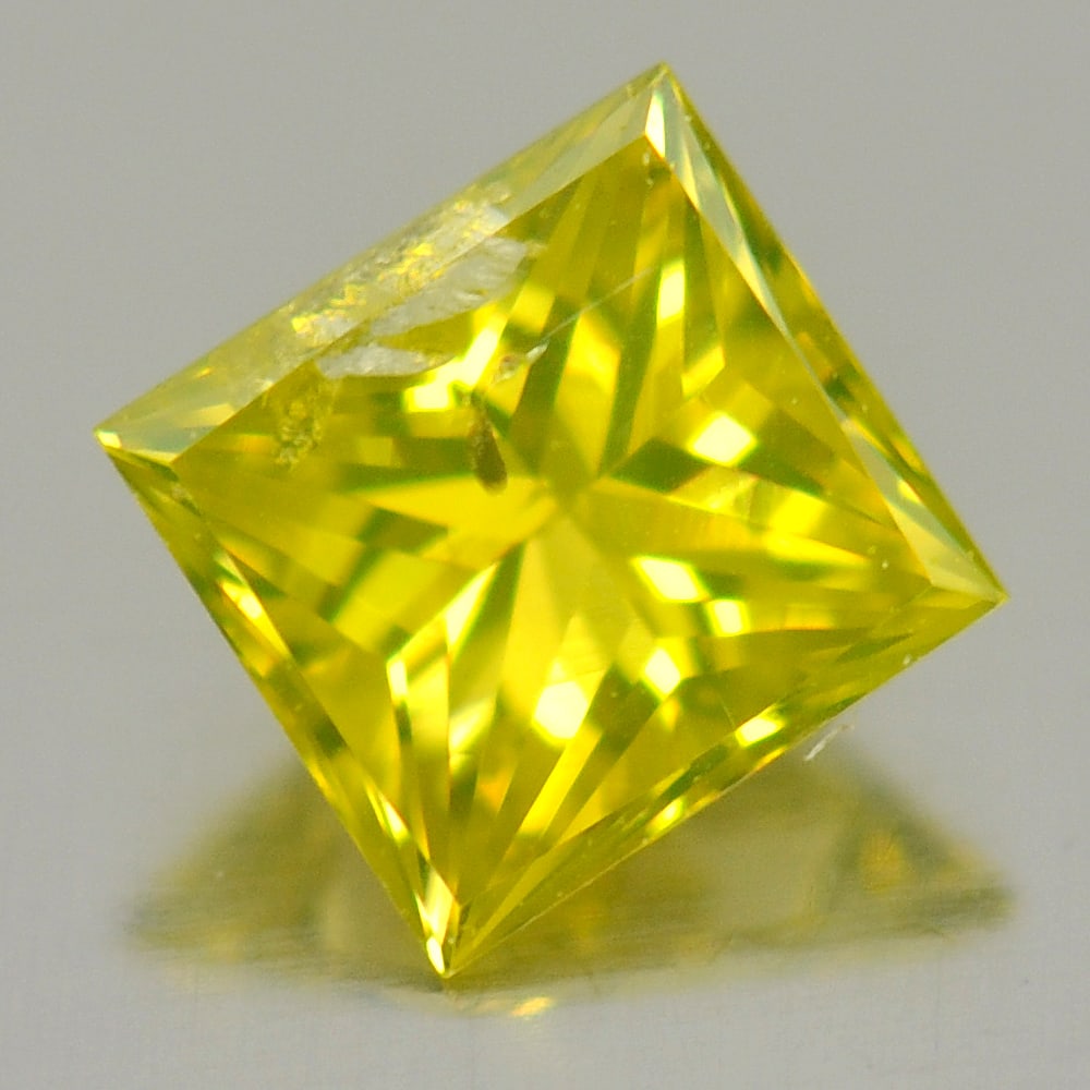 Natural Yellow Loose Diamond 0.17 Ct. Square Princess Cut Shape 3 Mm. From Belgium: Product ID: 802103706 Product Name: Natural Enhanced Diamond Weight: 0.17 CT. Size: 3 x 3 x 2 MM. Shape: Square Princess Cut Color: Yellow Clarity:SI1 Luster: Good Gems Origin: Belgium Treatment: Trea