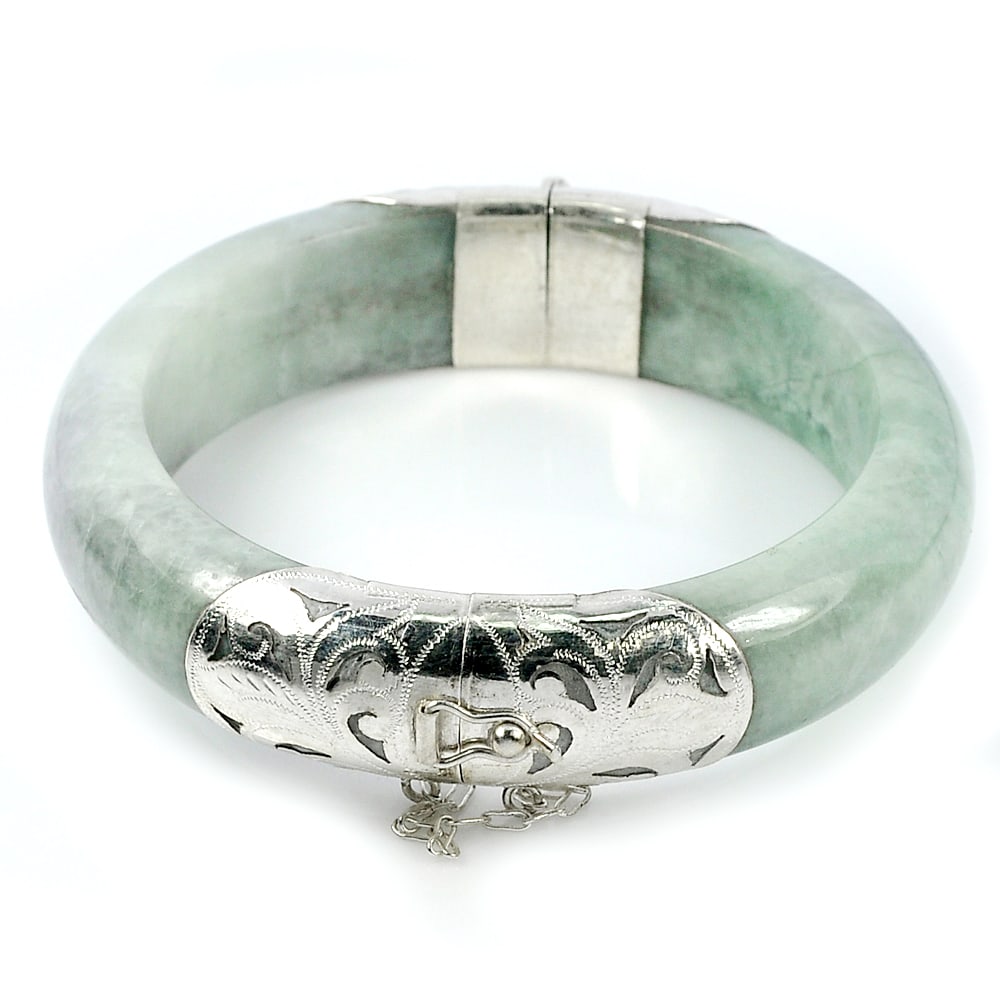 Natural Green Jade 425 Ct. Diameter 60 Mm. Bangle with Silver Jewelry From Thailand: Product ID: 819814074 Product Name: Natural Jade Weight: 425.00 CT. Size: 80 x 60 x 16 MM. Shape: Round Cabochon Color: Green Clarity:Opaque Luster: Good Gems Origin: Thailand Treatment: Unheated Crys
