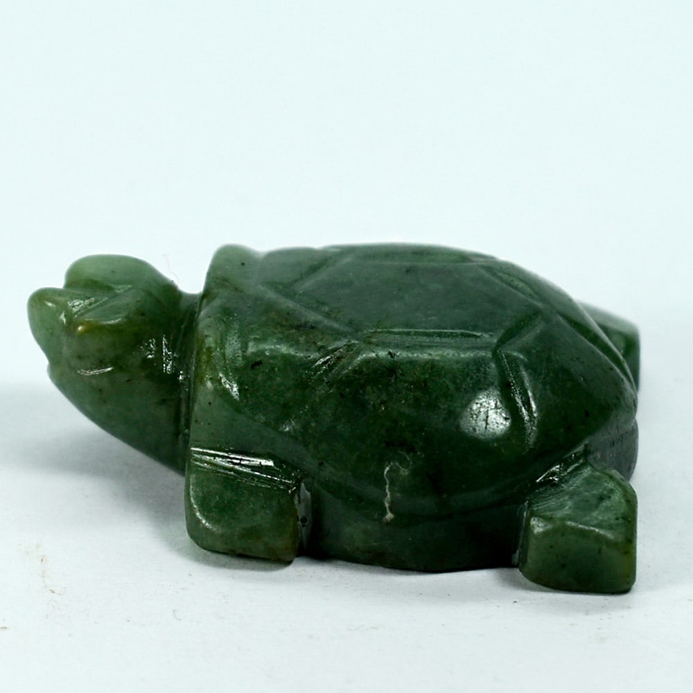 Natural Genuine Burmese Jade 234.60 Ct. Turtle Carving Shape: Product ID: 818102429 Product Name: Natural Gemstones Weight: 234.60 CT. Size: 35 x 48 x 16 MM. Shape: Caving Color: multi Color Green Clarity:Opaque Luster: Good Gems Origin: Burma Treatment: Unheate