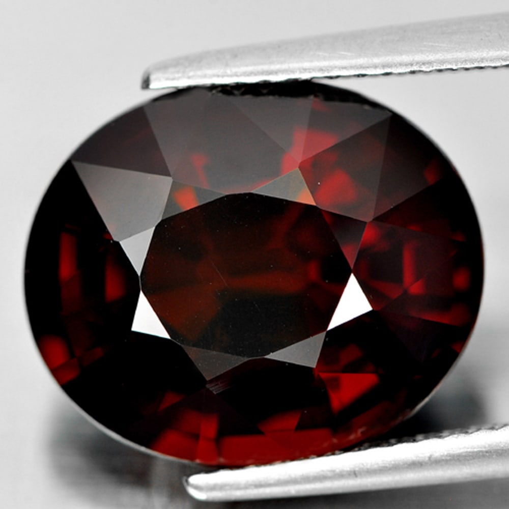 Natural Orangish Red Spessartine Garnet 12.24 Ct. Clean Oval Shape 14.4 x 12 Mm. Gemstone From: Product ID: 802923434 Product Name: Natural Spessartine Weight: 12.24 CT. Size: 14.4 x 12 x 8 MM. Shape: Oval Color: Orangish Red Clarity:IF Luster: Good Gems Origin: Nigeria Treatment: Unheated Cryst