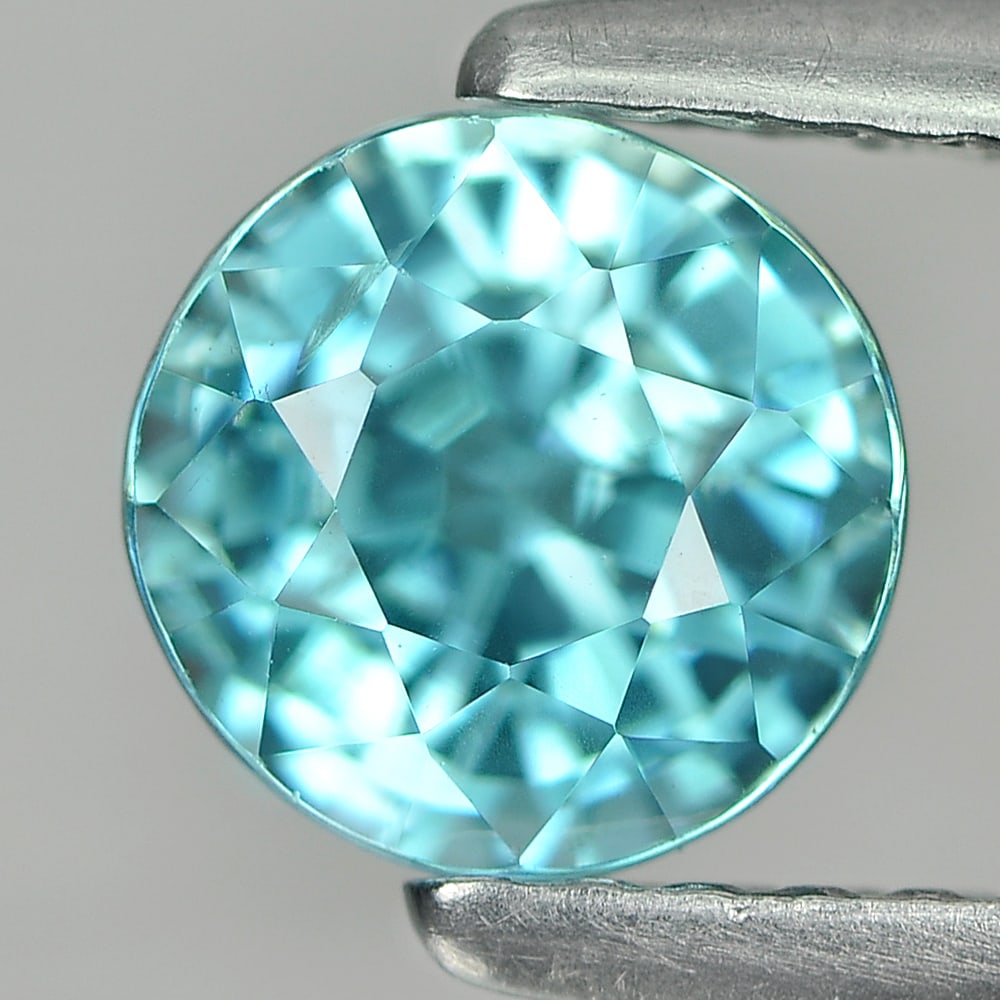 Natural Blue Zircon 1.87 Ct. Round Shape 6 Mm. Gemstone From Cambodia: Product ID: 807727003 Product Name: Natural Zircon Weight: 1.87 CT. Size: 6 x 6 x 5 MM. Shape: Round Color: Blue Clarity:VSI Luster: Good Gems Origin: Cambodia Treatment: Heated Crystal Structure: Tet