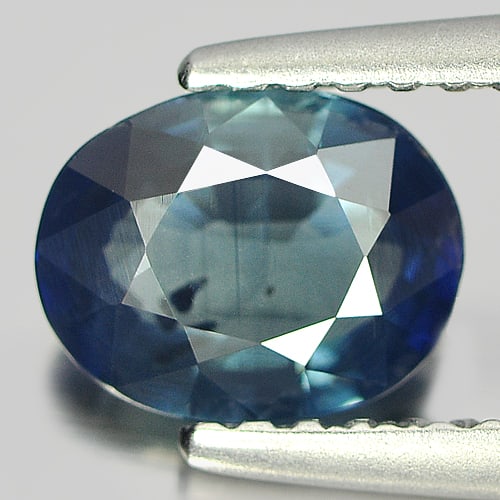 Natural Blue Sapphire 1.12 Ct. Oval Shape 7.1 x 5.5 Mm. Gemstone From Thailand: Product ID: 806144199 Product Name: Natural Blue Sapphire Weight: 1.12 CT. Size: 7.1 x 5.5 x 3.1 MM. Shape: Oval Color: Blue Clarity:SI Luster: Good Gems Origin: Thailand Treatment: Heated Crystal Str
