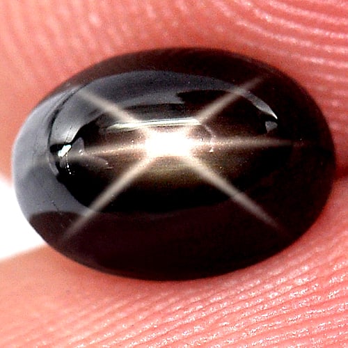 Natural Black Star 6 Rays Sapphire 2.41 Ct. Oval Cabochon Shape 7.9 x 5.7 Mm. Gemstone From Thailand: Product ID: 806145282 Product Name: Natural Star Sapphire Weight: 2.41 CT. Size: 7.9 x 5.7 x 5.1 MM. Shape: Oval Cabochon Color: Black Clarity:Opaque Luster: Good 6 Rays Star Gems Origin: Thailand Tre