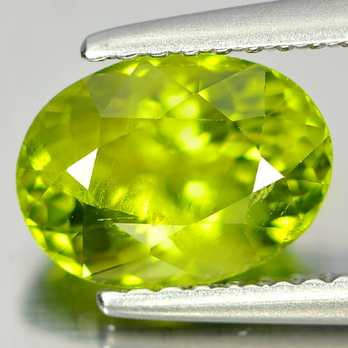 Natural Green Peridot 1.84 Ct. Oval Shape 8.6 x 6.4 Mm. Gemstone From Pakistan: Product ID: 805310009 Product Name: Natural Peridot Weight: 1.84 CT. Size: 8.6 x 6.4 x 5 MM. Shape: Oval Color: Green Clarity:SI Luster: Good Gems Origin: Pakistan Treatment: Unheated Crystal Structur