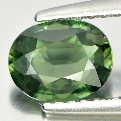 Natural Green Sapphire 0.98 Ct. VVS Oval Shape 7 x 5.5 Mm. Gemstone Thailand: Product ID: 806146409 Product Name: Natural Green Sapphire Weight: 0.98 CT. Size: 7 x 5.5 x 2.7 MM. Shape: Oval Color: Green Clarity:VVS Luster: Very Good Gems Origin: Thailand Treatment: Heated Cryst