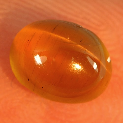 Natural Honey Green Cats Eye Apatite 1.45 Ct. Oval Cabochon Shape 7.1 x 5.4 Mm Gemstone From: Product ID: 800613381 Product Name: Natural Apatite Weight: 1.45 CT. Size: 7.1 x 5.4 x 4.1 MM. Shape: Oval Cabochon Color: Green Clarity:Semi - Transparent Luster: Good Gems Origin: Tanzania Treatment