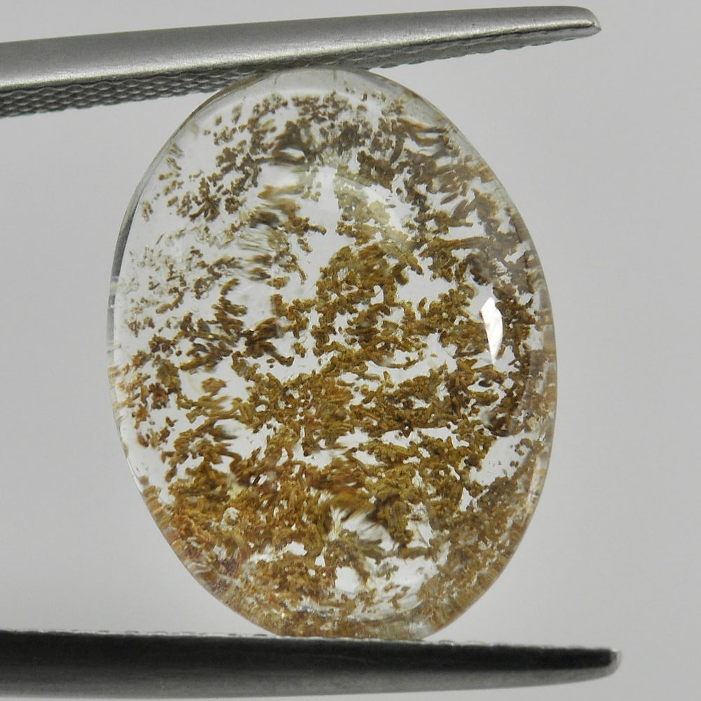 Natural Moss Quartz 12.02 Ct. Oval Cabochon Shape 17.7 x 13.5 Mm. Gemstone From Thailand: Product ID: 805529450 Product Name: Natural Quartz Weight: 12.02 CT. Size: 17.7 x 13.5 x 7.3 MM. Shape: Oval Cabochon Color: White Clarity:Semi - Transparent Luster: Good Gems Origin: Thailand Treatme