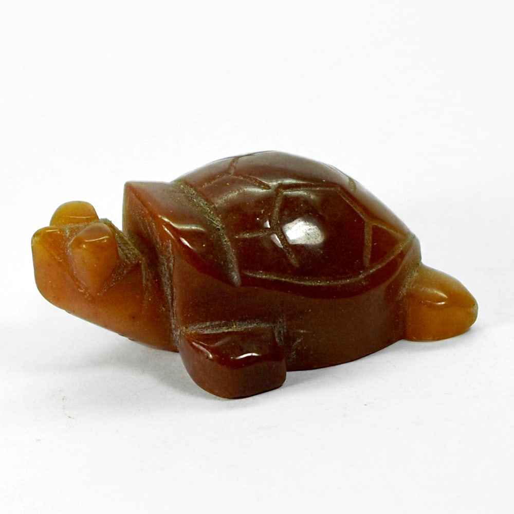 Natural Honey Jade 227.99 Ct. Turtle Carving Size 32 x 50 x 20 Mm.: Product ID: 818102436 Product Name: Natural Gemstones Weight: 227.99 CT. Size: 32 x 50 x 20 MM. Shape: Caving Color: multi Color brown Honey Clarity:Opaque Luster: Good Gems Origin: Burma Treatment: U