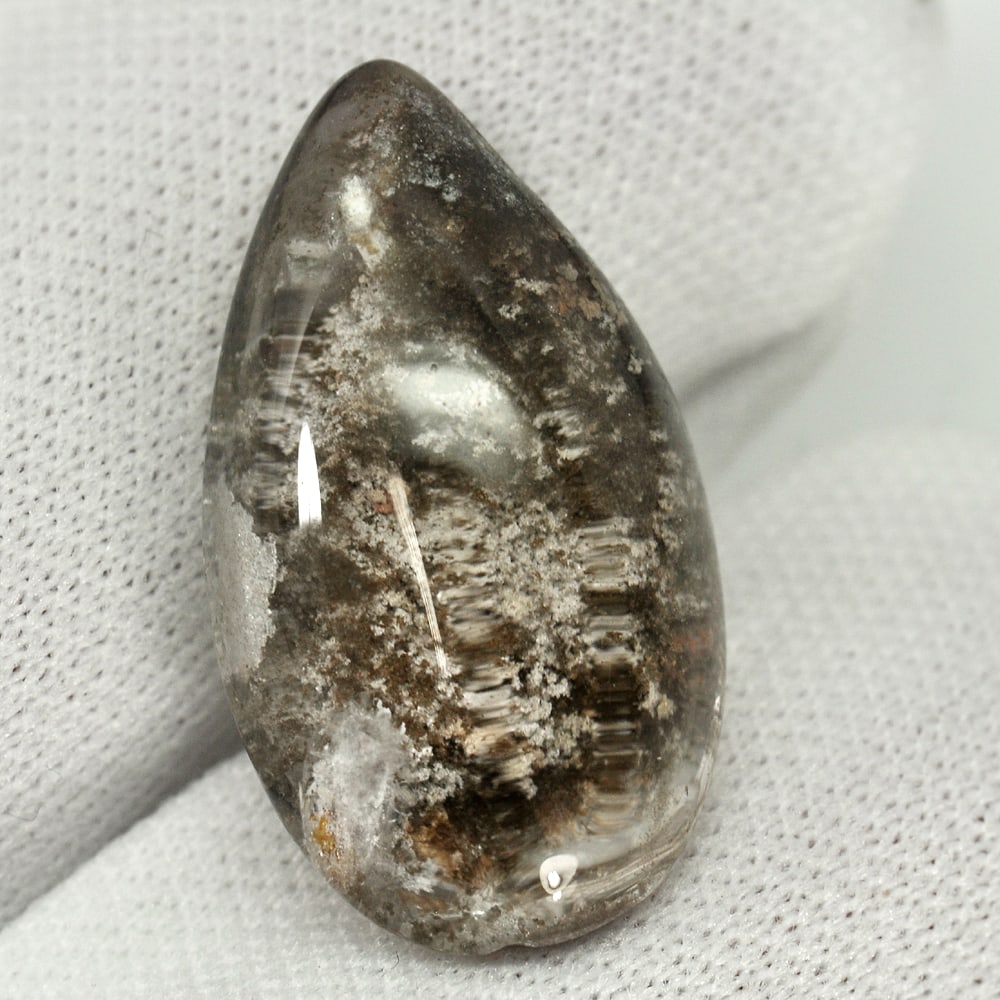 Natural White Brown Moss Quartz 16.72 Ct. Pear Cabochon Shape 23 x 13.7 Mm. Gemstone From Thailand: Product ID: 805529511 Product Name: Natural Quartz Weight: 16.72 CT. Size: 23 x 13.7 x 8.3 MM. Shape: Pear Cabochon Color: White Clarity:Semi - Transparent Luster: Good Gems Origin: Thailand Treatment