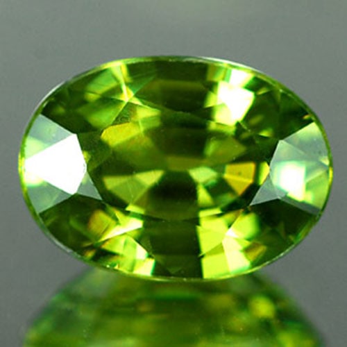 Natural Unheated Green Demantoid Garnet 1.02 Ct. Oval Shape 7.1 x 5.1 Mm. Gemstone From Madagascar: Product ID: 802922432 Product Name: Natural Demantoid Weight: 1.02 CT. Size: 7.1 x 5.1 x 3.2 MM. Shape: Oval Color: Green Clarity:VSI Luster: Very Good Gems Origin: Mardagascar Treatment: Unheated Cry