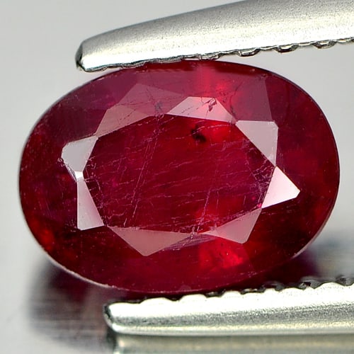 Natural Pinkish Red Ruby 1.38 Ct. Oval Shape 7.1 x 5.1 Mm. Gemstone From Madagascar: Product ID: 805932920 Product Name: Natural Ruby Weight: 1.38 CT. Size: 7.1 x 5.1 x 4 MM. Shape: Oval Color: Pinkish Red Clarity:SI1 Luster: Good Gems Origin: Madagascar Treatment: Heated (Lead glass 