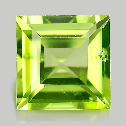 Natural Green Peridot 1.15 Ct. Square Shape 6 Mm. Gemstone From Pakistan: Product ID: 805315655 Product Name: Natural Peridot Weight: 1.15 CT. Size: 6 x 6 x 3.5 MM. Shape: Square Color: Green Clarity:VSI Luster: Good Gems Origin: Pakistan Treatment: Unheated Crystal Structu