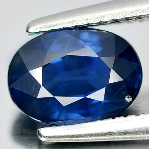 Natural Blue Sapphire 1.11 Ct. Oval Shape 6.7 x 4.9 x 3.5 Mm. Gemstone From Thailand: Product ID: 806008149 / Product Name: Natural Blue Sapphire / Weight: 1.11 CT. / Size: 6.7 x 4.9 x 3.5 MM. / Shape: Oval / Color: Blue / Clarity:SI / Luster: Good / Gems Origin: Thailand / Treatment: 