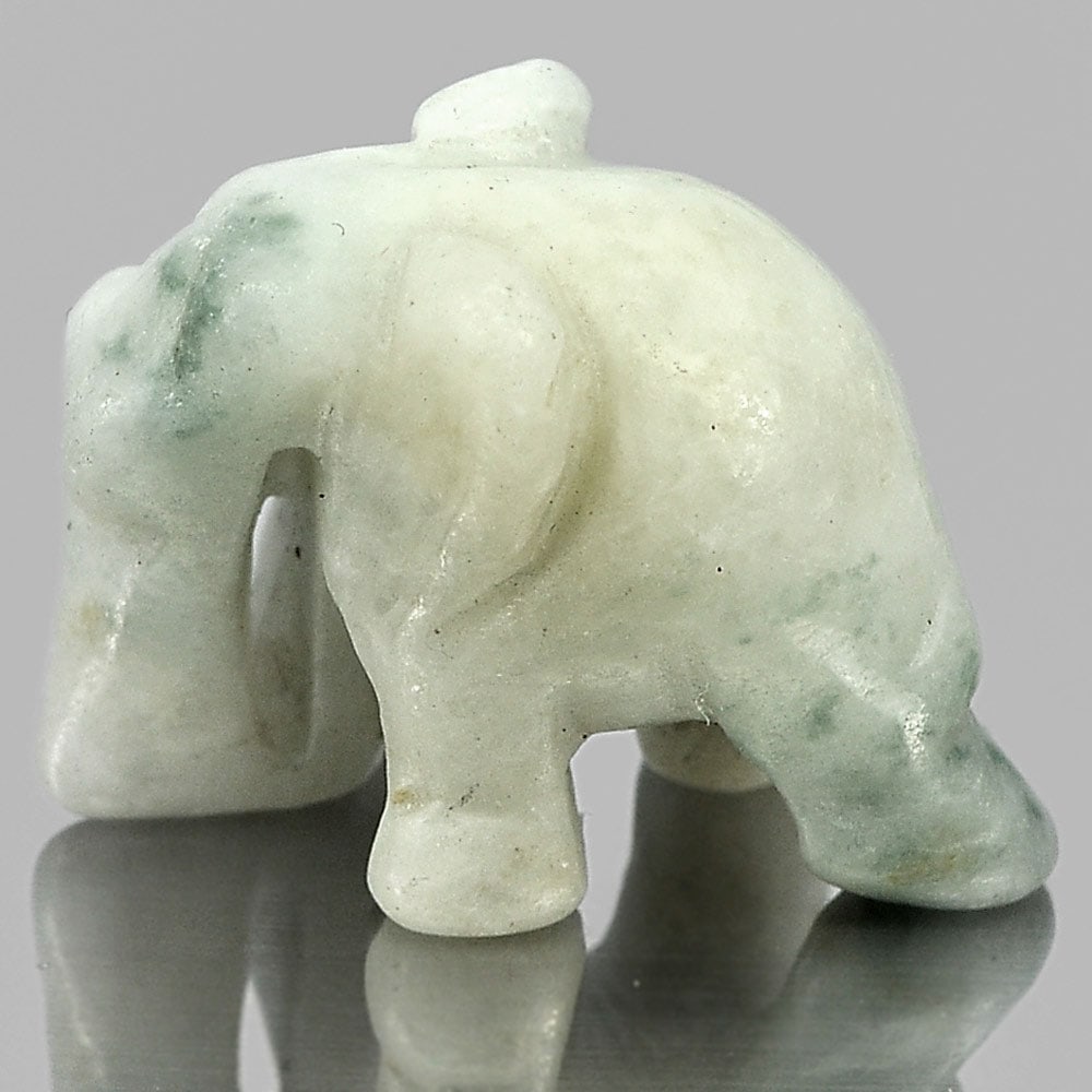 Natural Green White Color Jade 49.35 Ct. Elephant Carving Size 25 x 18 Mm. Gemstone Unheated: Product ID: 819812980 Product Name: Natural Jade Weight: 49.35 CT. Size: 25 x 18 x 15 MM. Shape: Elephant Carving Color: Green Clarity:Opaque Luster: Good Gems Origin: Thailand Treatment: Unheated Cry
