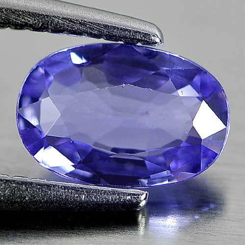Natural Violetish Blue Tanzanite 0.64 Ct. Clean Oval Shape 6.8 x 4.6 Mm. Gemstone From Tanzania: Product ID: 807001792 Product Name: Natural Tanzanite Weight: 0.64 CT. Size: 6.8 x 4.6 x 2.8 MM. Shape: Oval Color: Violetish Blue Clarity:IF Luster: Good Gems Origin: Tanzania Treatment: Heated Cryst