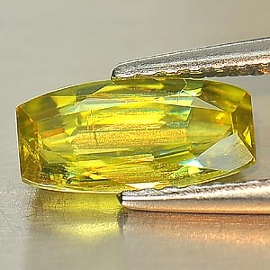 Natural Multi Color Titanium Sphene With Rainbow Spark 0.93 Ct. Cushion Shape 8.7 x 4.3 Mm Gemstone: Product ID: 806507083 Product Name: Natural Sphene Weight: 0.93 CT. Size: 8.7 x 4.3 x 2.7 MM. Shape: Cushion Color: Multi Color With Rainbow Spark Clarity:SI Luster: Adamantine Gems Origin: Madagascar