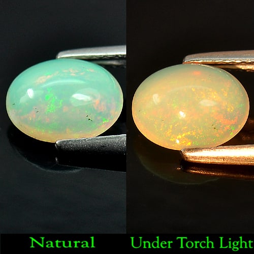 Natural Multi Color Opal 0.97 Ct. Oval Cabochon Shape 9 x 7 Mm. Unheated Gemstone: Product ID: 818727415 Product Name: Natural Opal Weight: 0.97 CT. Size: 9 x 7 x 3.8 MM. Shape: Oval Cabochon Color: Multi-Color Clarity:Semi - Transparent Luster: Good Gems Origin: Ethiopia Treatment: