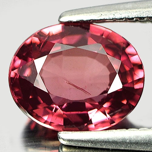 Natural Purplish Pink Rhodolite Garnet 1.35 Ct. Oval Shape 7.4 x 6 Mm. Gemstone from Tanzania: Product ID: 802934012 Product Name: Natural Rhodolite Weight: 1.35 CT. Size: 7.4 x 6 x 3.4 MM. Shape: Oval Color: Purplish Pink Clarity:VSI Luster: Good Gems Origin: Tanzania Treatment: Unheated Cryst