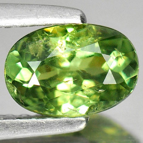 Natural Demantoid Garnet Green 1.20 Ct. Oval Shape 7.5 x 5.2 Mm. Unheated Gemstone: Product ID: 802930169 Product Name: Natural Demantoid Weight: 1.20 CT. Size: 7.5 x 5.2 x 3.7 MM. Shape: Oval Color: Green Clarity:SI1 Luster: Good Gems Origin: Madagascar Treatment: Unheated Crystal S