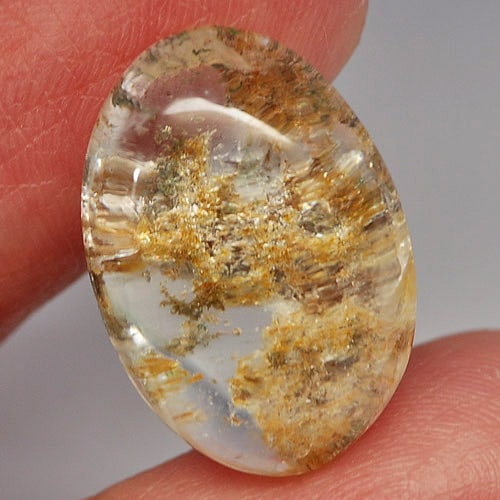 Natural Moss Quartz 16.54 Ct. Oval Cabochon Shape 20 x 14 Mm. Gemstone: Product ID: 805527125 Product Name: Natural Quartz Weight: 16.54 CT. Size: 20 x 14 x 9 MM. Shape: Oval Cabochon Color: White Clarity:Semi - Transparent Luster: Good Gems Origin: Thailand Treatment: Un
