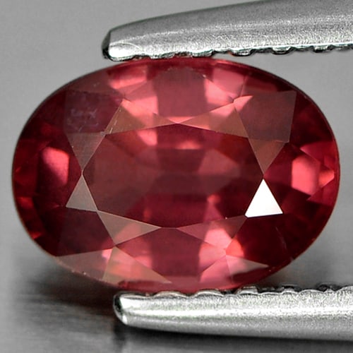 Natural Purple Pink Rhodolite Garnet 0.97 Ct. Oval Shape 7 x 5.1 Mm. Gemstone From Madagascar: Product ID: 802921076 Product Name: Natural Rhodolite Weight: 0.97 CT. Size: 7 x 5.1 x 3.4 MM. Shape: Oval Color: Purple Pink Clarity:VSI Luster: Good Gems Origin: Mardagascar Treatment: Unheated Crys