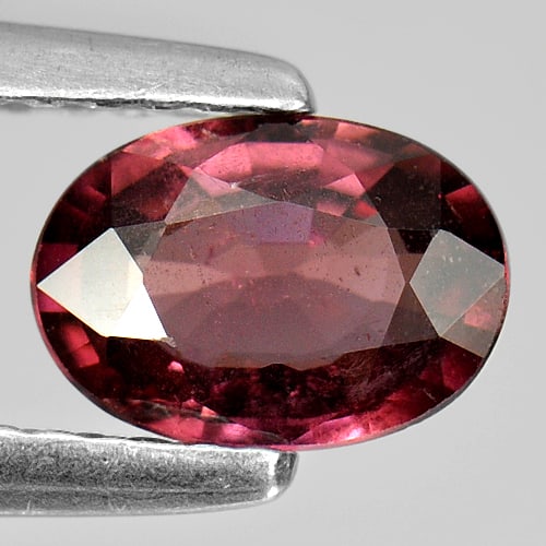 Natural Purple Pink Rhodolite Garnet 0.79 Ct. Oval Shape 7 x 5 Mm. Gemstone Unheated From Madagascar: Product ID: 802921094 Product Name: Natural Rhodolite Weight: 0.79 CT. Size: 7 x 5 x 2.7 MM. Shape: Oval Color: Purple Pink Clarity:VSI Luster: Good Gems Origin: Mardagascar Treatment: Unheated Crysta