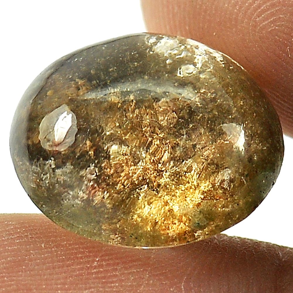 Natural Moss Quartz 14.84 Ct. Oval Cabochon Shape 16.4 x 15 Mm. Gemstone Unheated From Thaiand: Product ID: 805529200 Product Name: Natural Quartz Weight: 14.84 CT. Size: 16.4 x 15 x 9 MM. Shape: Oval Cabochon Color: Multi-Color Clarity:Semi - Transparent Luster: Good Gems Origin: Thailand Treat