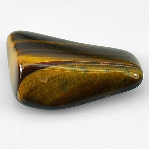 Natural Fancy Cabochon Tiger Eye Agate 12.45 Ct. Fancy Cabochon 20 x 15.7 Mm Gemstone From: Product ID: 860000652 Product Name: Natural Agate Weight: 12.45 CT. Size: 20 x 15.7 x 7 MM. Shape: Fancy Cabochon Color: Yellow Brown Clarity:Opaque Luster: Good Gems Origin: Madagascar Treatment: Unh
