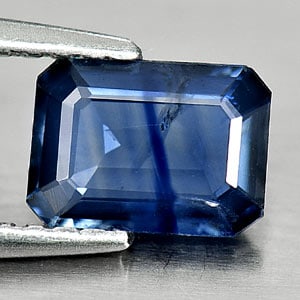Natural Blue Sapphire 0.90 Ct. Octagon Shape 6.8 x 4.9 Mm Gemstone From Thailand: Product ID: 806004180 Product Name: Natural Blue Sapphire Weight: 0.90 CT. Size: 6.8 x 4.9 x 2.1 MM. Shape: Octagon Color: Blue Clarity:VSI Luster: Good Gems Origin: Bangkaja,Thailand Treatment: Heate