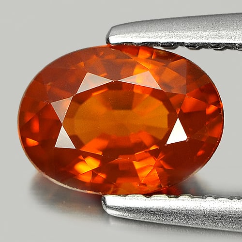Orangish Red Spessartine Garnet 0.89 Ct. Oval Shape 7.1 x 5.1 Mm. Natural Unheated Gemstone From: Product ID: 802920817 Product Name: Natural Spessartine Weight: 0.89 CT. Size: 7.1 x 5.1 x 3.3 MM. Shape: Oval Color: Orangish Red Clarity:VVS Luster: Good Gems Origin: Nigeria Treatment: Unheated Cry