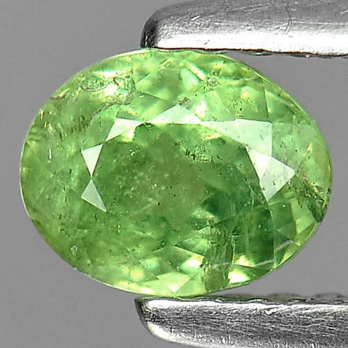 Natural Green Demantoid Garnet 0.84 Ct. Oval Shape 5.8 x 4.7 Mm. Gemstone From Madagascar: Product ID: 802919291 Product Name: Natural Demantoid Weight: 0.84 CT. Size: 5.8 x 4.7 x 3.8 MM. Shape: Oval Color: Green Clarity:SI Luster: Good Gems Origin: Madagascar , Africa Treatment: Unheated C
