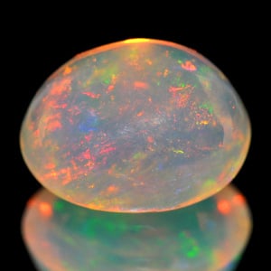 Natural Multi Color Opal 1.30 Ct. Oval Cabochon Shape 8 x 6.5 Mm. Unheated Gemstone: Product ID: 818710111 Product Name: Natural Opal Weight: 1.30 CT. Size: 8 x 6.5 x 4.7 MM. Shape: Oval Cabochon Color: Multi Color Clarity:Semi - Transparent Luster: Good Gems Origin: Ethiopia Treatmen