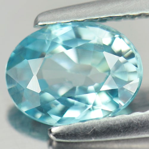 Natural Blue Zircon 1.63 Ct. Oval Shape 7.9 x 6 Mm Gemstone From Cambodia: Product ID: 807718742 Product Name: Natural Zircon Weight: 1.63 CT. Size: 7.9 x 6 x 3.4 MM. Shape: Oval Color: Blue Clarity:VVS Luster: Good Gems Origin: Cambodia Treatment: Heated Crystal Structure: