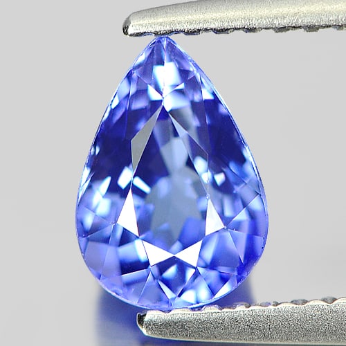 Natural Violetish Blue Tanzanite 1.22 Ct. Clean Pear Shape 7.90 x 5.55 Mm. Gemstone From Tanzania: Product ID: 807006046 Product Name: Natural Tanzanite Weight: 1.22 CT. Size: 7.90 x 5.55 x 4.40 MM. Shape: Pear Color: Blue Clarity:IF Luster: Very Good Gems Origin: Tanzania Treatment: Heated Crystal