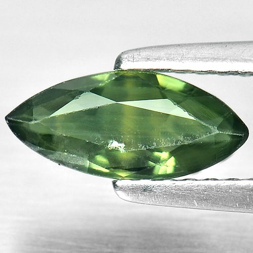 Natural Yellowish Green Sapphire 0.89 Ct. Marquise Shape 9.7 x 4.4 Mm Gemstone From Thailand: Product ID: 806148304 Product Name: Natural Green Sapphire Weight: 0.89 CT. Size: 9.7 x 4.4 x 2.5 MM. Shape: Marquise Color: Yellowish Green Clarity:SI1 Luster: Good Gems Origin: Thailand Treatment: H