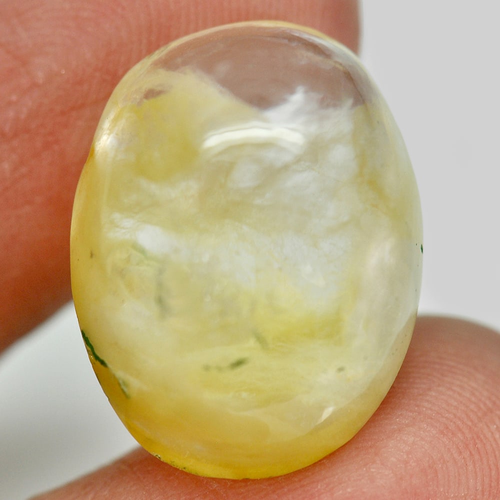 Natural Moss Quartz 20.39 Ct. Oval Cabochon 19.7 x 15.1 Mm. Unheated Gemstone: Product ID: 805529418 Product Name: Natural Quartz Weight: 20.39 CT. Size: 19.7 x 15.1 x 10.1 MM. Shape: Oval Cabochon Color: White Clarity:Semi - Transparent Luster: Good Gems Origin: Thailand Treatm