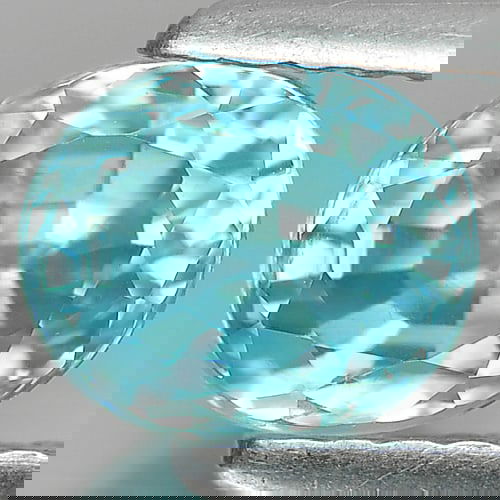 Natural Blue Zircon 1.82 Ct. Oval Shape 6.7 x 5.7 Mm Gemstone From Cambodia: Product ID: 807713127 Product Name: Natural Zircon Weight: 1.82 CT. Size: 6.7 x 5.7 x 5.2 MM. Shape: Oval Color: Blue Clarity:VSI Luster: Good Gems Origin: Cambodia Treatment: Heated Crystal Structure