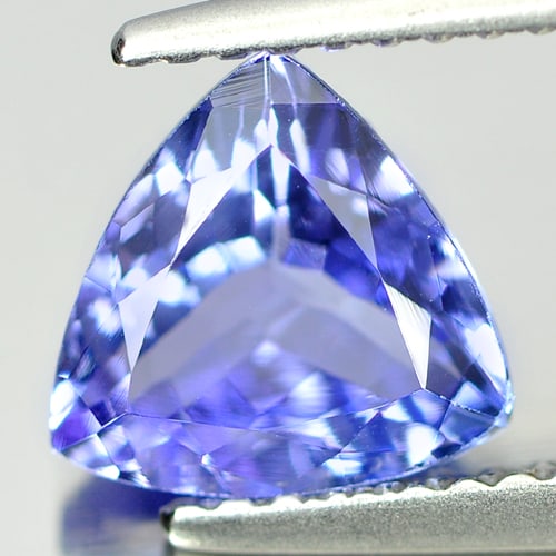 Natural Violetish Blue Tanzanite 1.46 Ct. VVS Trilliant Shape 7.7 x 7.5 Mm. Gemstone From Tanzania: Product ID: 807009313 Product Name: Natural Tanzanite Weight: 1.46 CT. Size: 7.7 x 7.5 x 4.1 MM. Shape: Trilliant Color: Blue Clarity:VVS Luster: Very Good Gems Origin: Tanzania Treatment: Heated Crys