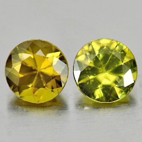 Natural Green Demantoid Garnet 0.93 Ct. 2 Pcs. Round Shape 4.6 Mm. Unheated Gemstones: Product ID: 802931625 Product Name: Natural Demantoid Weight: 0.93 CT. Size: 4.6 x 4.6 x 2.8 MM. Shape: Round Color: Greenish Yellow Clarity:SI1 Luster: Very Good Gems Origin: Madagascar Treatment: Un