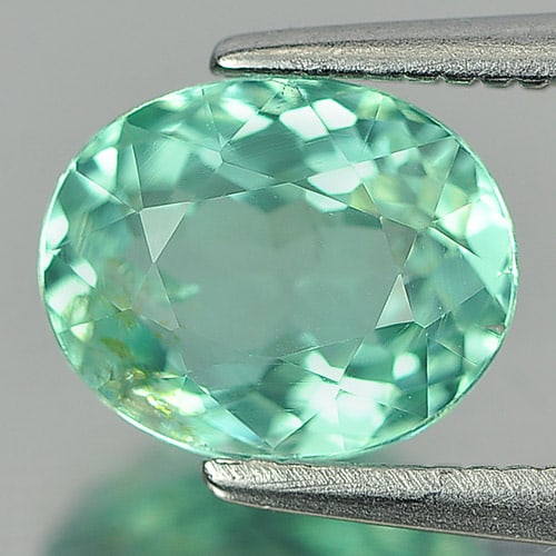 Natural Paraiba Color Apatite 1.54 Ct. Oval Shape 8 x 6.4 Mm. Gemstone Unheated: Product ID: 800612573 Product Name: Natural Apatite Weight: 1.54 CT. Size: 8 x 6.4 x 4.2 MM. Shape: Oval Color: Neon Green Clarity:VSI Luster: Good Gems Origin: Tanzania Treatment: Unheated Crystal St