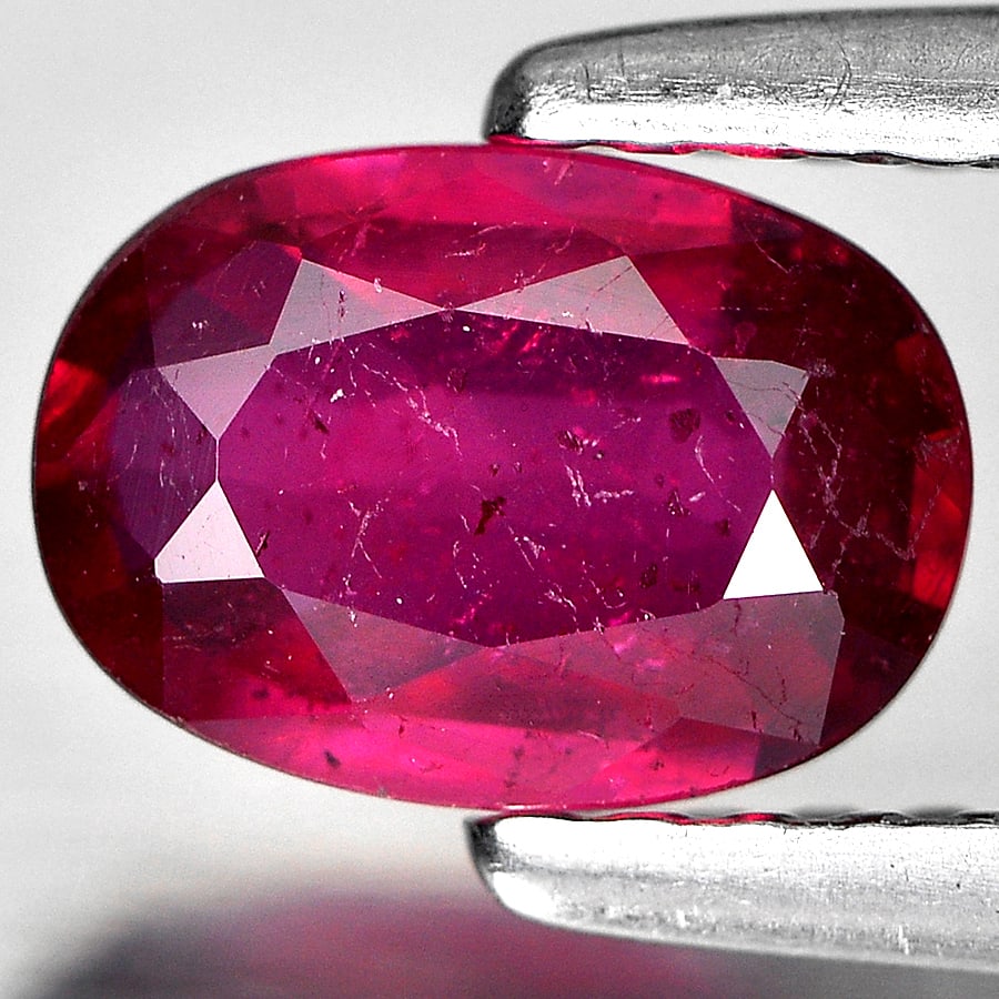 Natural Purplish Red Ruby 0.99 Ct. Oval Shape 7.2 x 5 Mm. Gemstone From Madagascar: Product ID: 805934887 Product Name: Natural Ruby Weight: 0.99 CT. Size: 7.2 x 5 x 2.6 MM. Shape: Oval Color: Red Clarity:SI1 Luster: Good Gems Origin: Madagascar Treatment: Heated (Lead glass fillin C