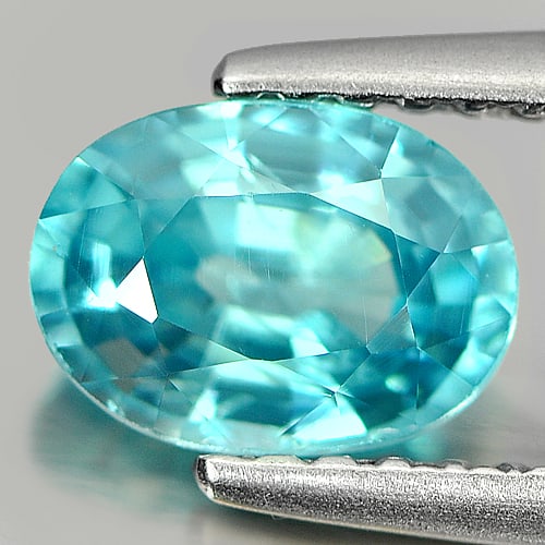 Natural Blue Zircon 1.36 Ct. Oval Shape 7 x 5.2 Mm. Gemstone From Cambodia: Product ID: 807711207 Product Name: Natural Zircon Weight: 1.36 CT. Size: 7 x 5.2 x 3.6 MM. Shape: Oval Color: Blue Clarity:SI Luster: Good Gems Origin: Cambodia Treatment: Heated Crystal Structure: T