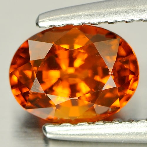 Natural Orangish Red Spessartine Garnet 0.93 Ct. Oval Shape 6.6 x 5.1 Mm Gemstone From Nigeria: Product ID: 802920808 Product Name: Natural Spessartine Weight: 0.93 CT. Size: 6.6 x 5.1 x 4 MM. Shape: Oval Color: Orangish Red Clarity:VVS Luster: Good Gems Origin: Nigeria Treatment: Unheated Cryst