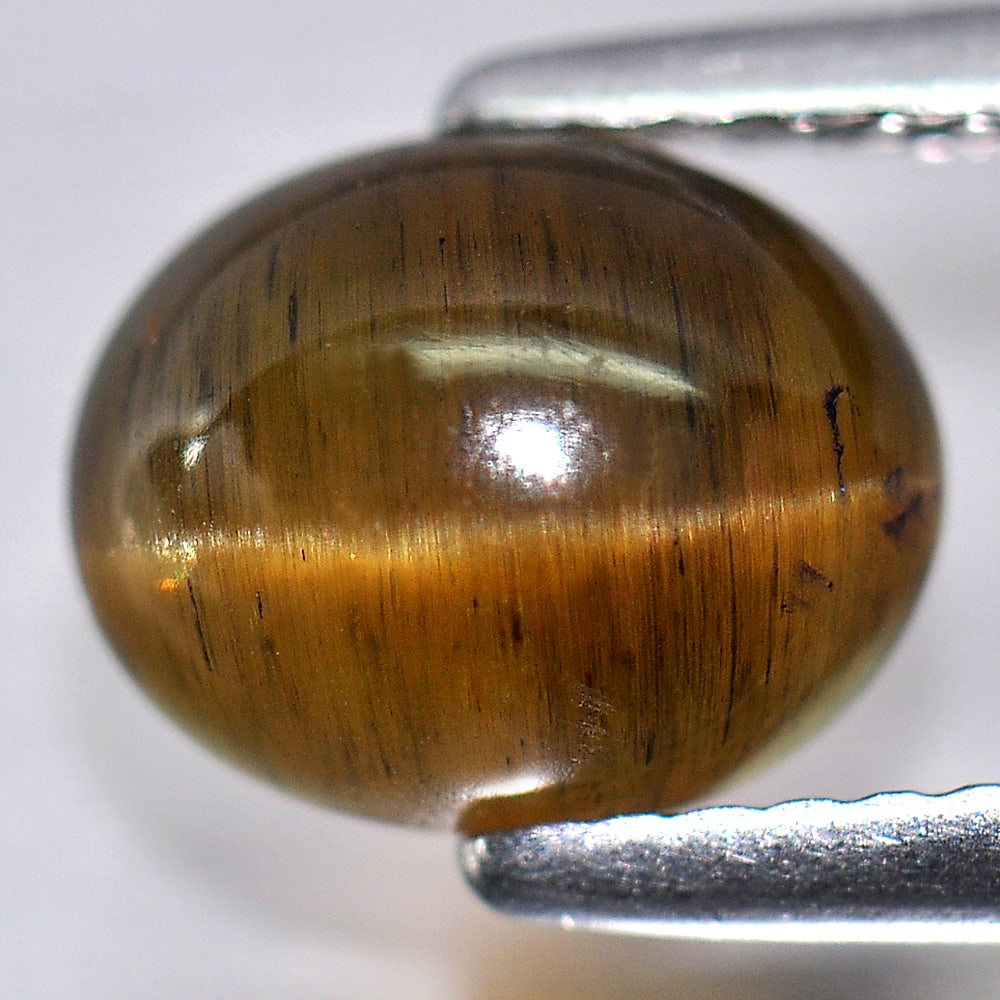 Natural Brown Green Cats Eye Apatite 2.09 Ct. Oval Cabochon 8.5 x 6.9 Mm Unheated Gemstone From: Product ID: 100601643 Product Name: Natural Apatite Weight: 2.09 CT. Size: 8.5 x 6.9 x 4.2 MM. Shape: Oval Cabochon Color: Multi-Color Clarity:Opaque Luster: Good Gems Origin: Tanzania Treatment: Unhe