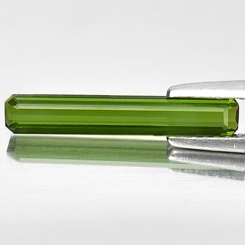 Natural Green Tourmaline 1.28 Ct. Clean Octagon Shape 18.4 x 3 Mm. Gemstone From Nigeria: Product ID: 807245201 Product Name: Natural Tourmaline Weight: 1.28 CT. Size: 18.4 x 3 x 2 MM. Shape: Octagon Color: Green Clarity:IF Luster: Very Good Gems Origin: Nigeria Treatment: Unheated Crystal