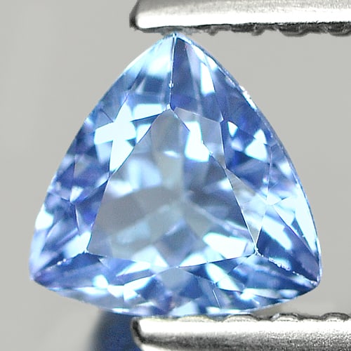 Natural Violetish Blue Tanzanite 0.53 Ct. Trilliant Shape 5.2 x 5.3 Mm. Gemstone From Tanzania: Product ID: 807006940 Product Name: Natural Tanzanite Weight: 0.53 CT. Size: 5.2 x 5.3 x 3.1 MM. Shape: Trilliant Color: Violetish Blue Clarity:VSI Luster: Good Gems Origin: Tanzania Treatment: Heated